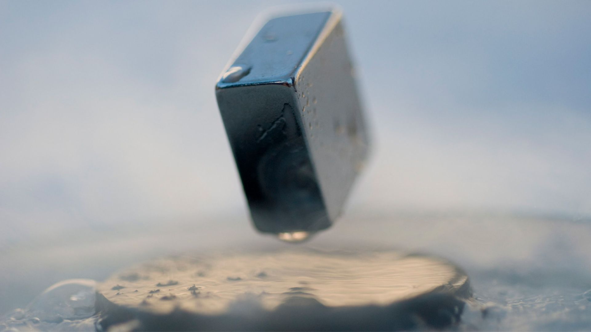 Levitation of a magnet on top of a superconductor