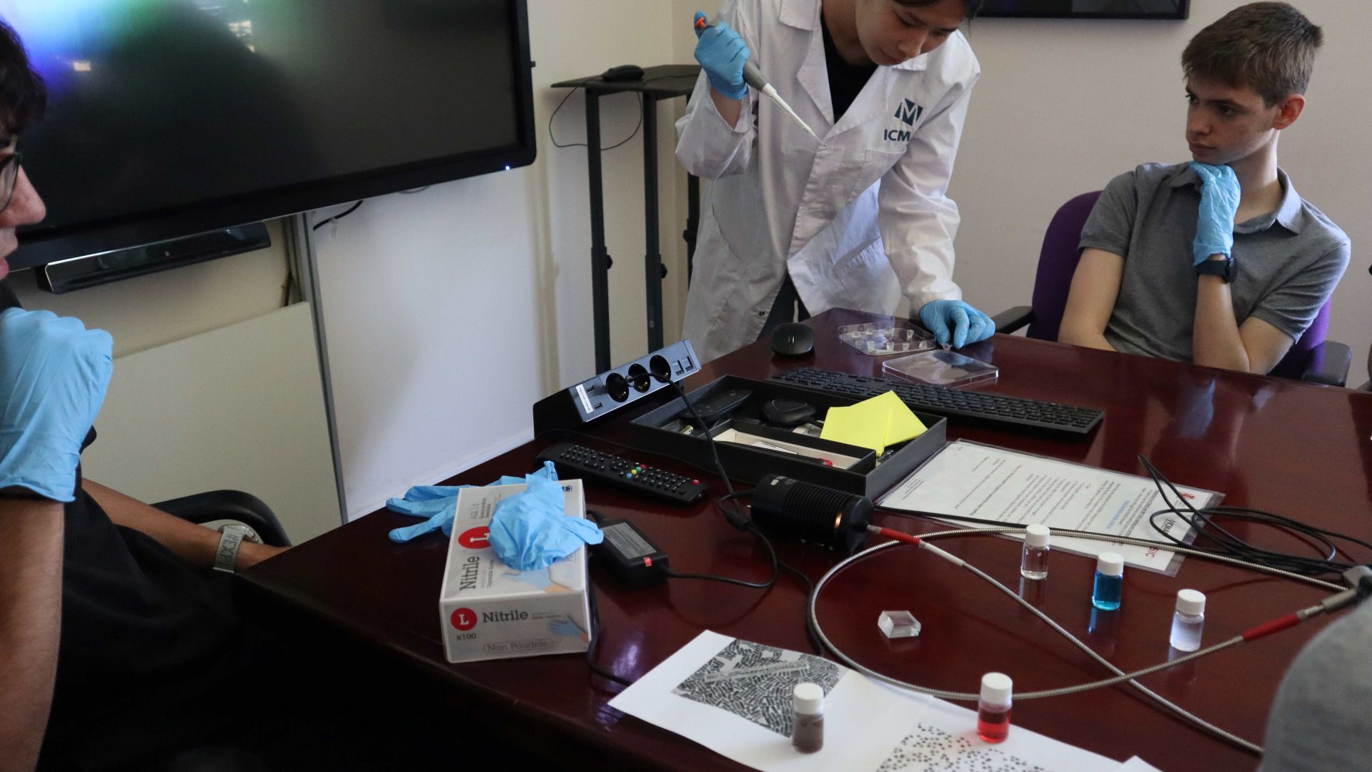 Xiaoyu Qi in the middle of nanoparticle synthesis